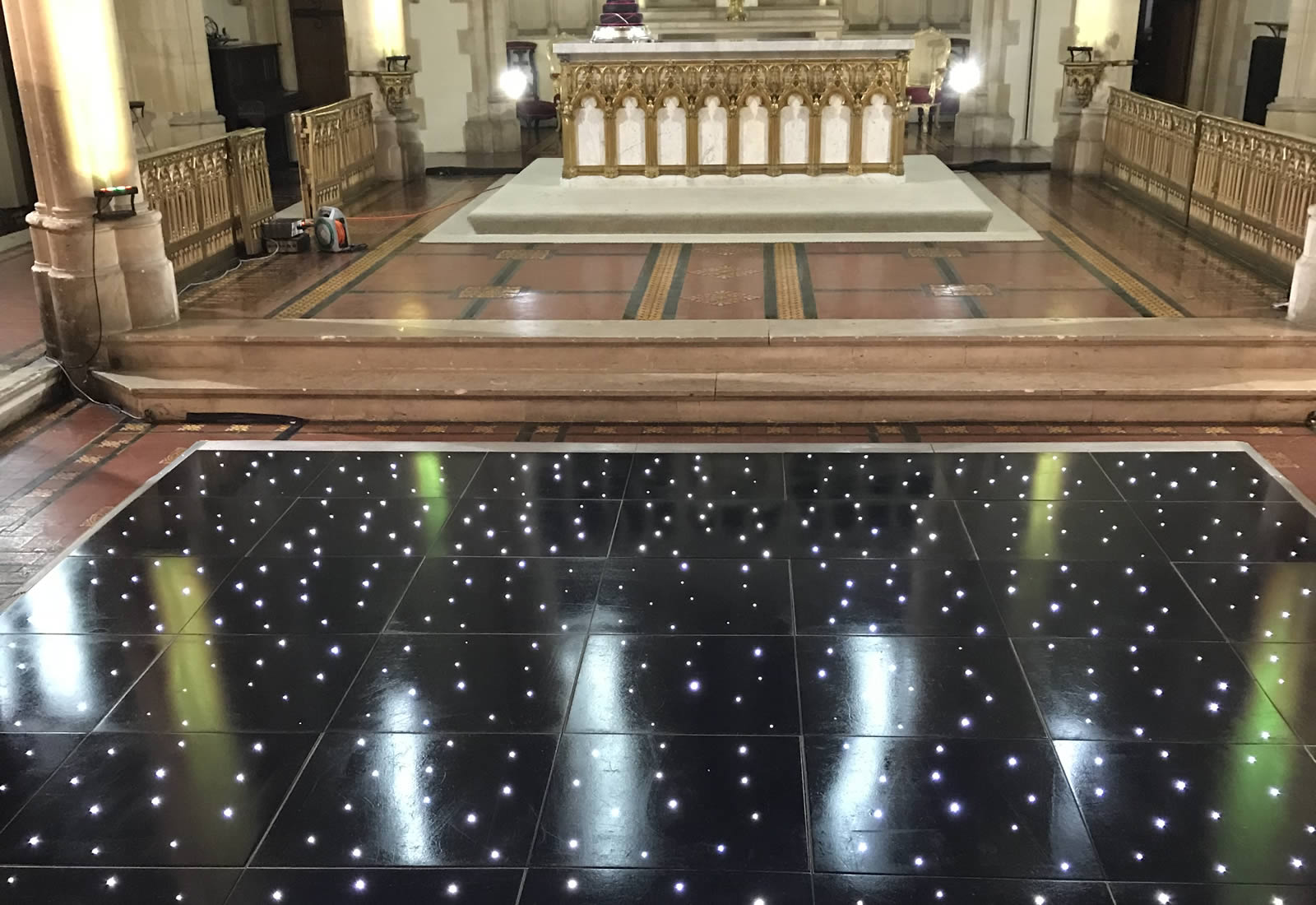 Black LED dance floor in church chapel