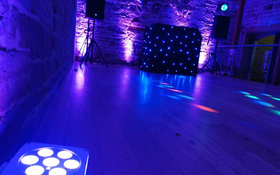 disco lights and uplighters on dance floor